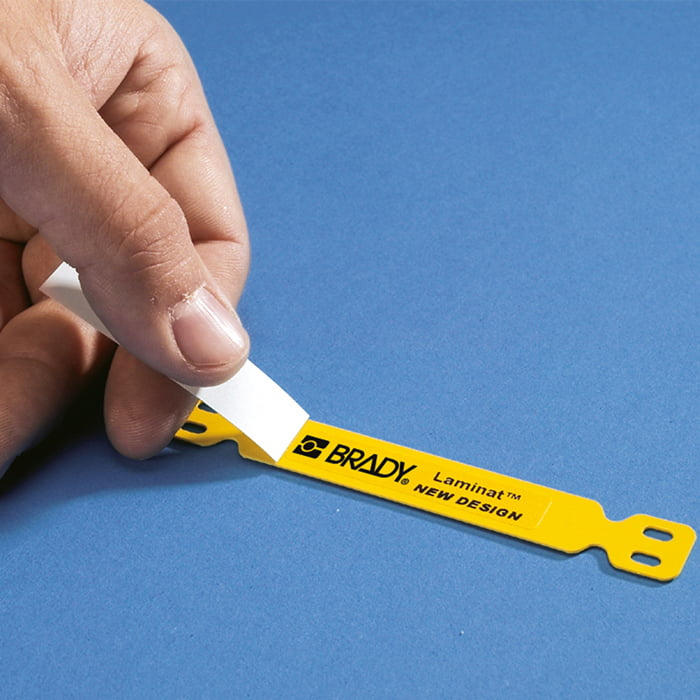 Laminate label carrier (yellow plastic)